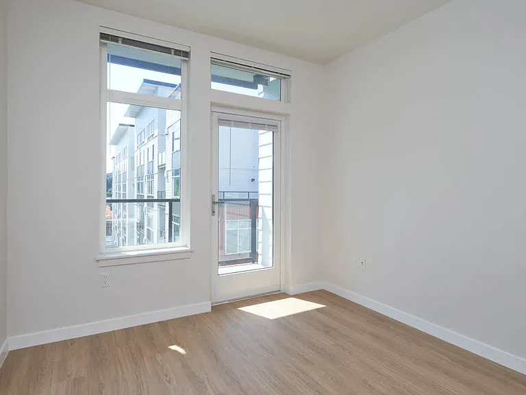 Bedroom with Balcony and Hard Surface Flooring