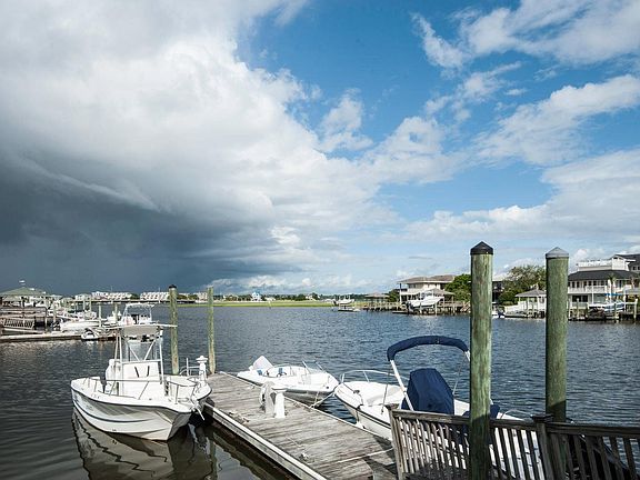 Boatslip Conveys With Each Unit