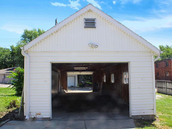 HUGE garage with alley and front driveway access.