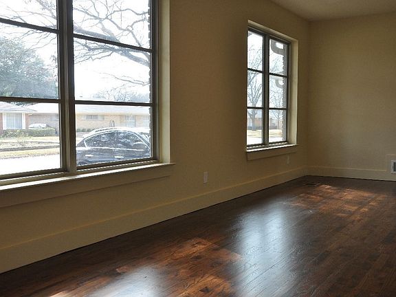 large formal dining & living room filled with natural light