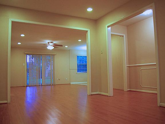 Step right inside and be welcomed by a beautiful wood floor,