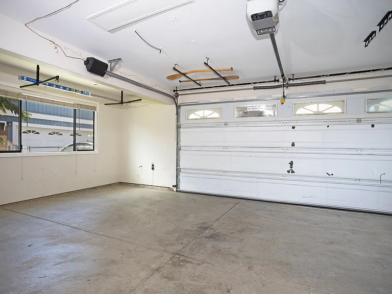 Spacious, Enclosed 520 Square Foot, 2-Car Garage with Split AC Unit for Your Home Workouts! High Efficiency Washer and Dryer!