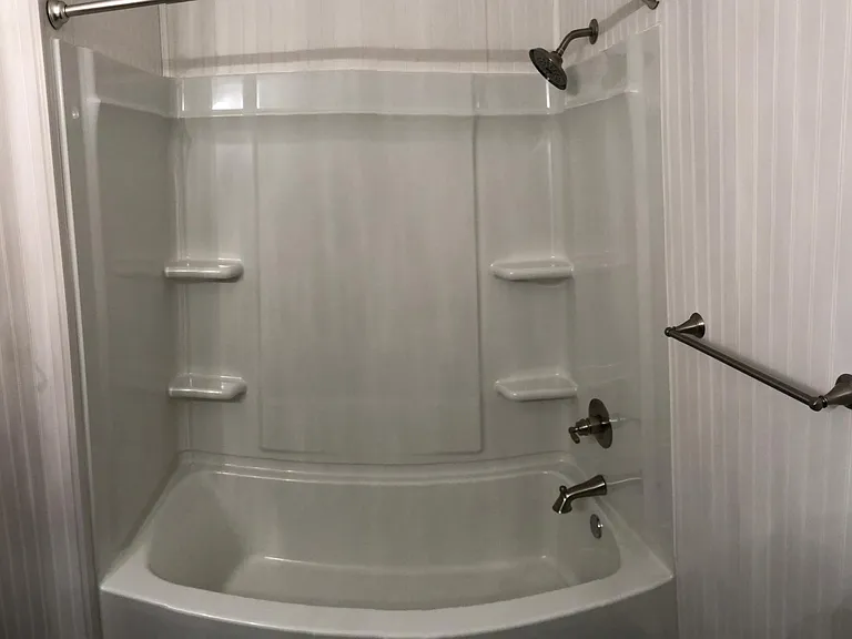 Complete new full bath insert with all new plumbing and fixtures