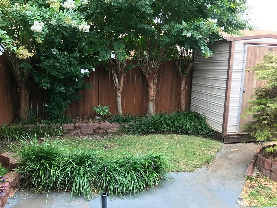 Backyard perfect for sitting and drinking coffee under your covered back porch and letting the kids or dog play!