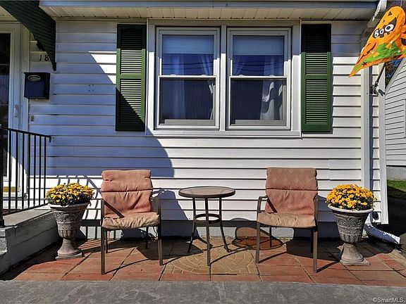 Pretty walk-way and patio area welcome you!