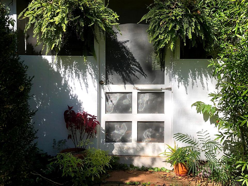 Main entry- front door into screen porch