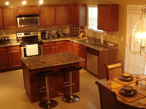 Granite countertops, tile backsplach, new tile flooring