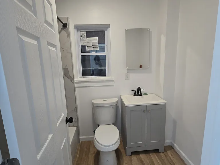Renovated full bathroom.