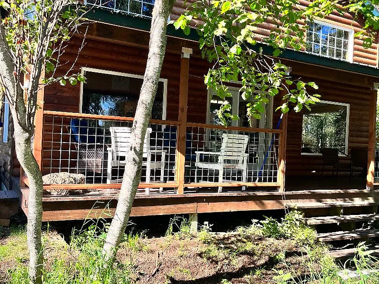 Covered and fenced back deck