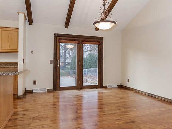 Eat in portion of the kitchen has nice view of the backyard. Perfect for watching the kidos in the fenced yard.