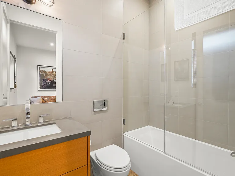The first floor offers a full bathroom en-suite to the office/den, as well as a dedicated powder room