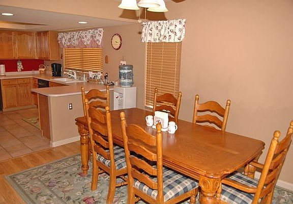 Spacious kitchen open to dining and VIEWS to Lush yard!