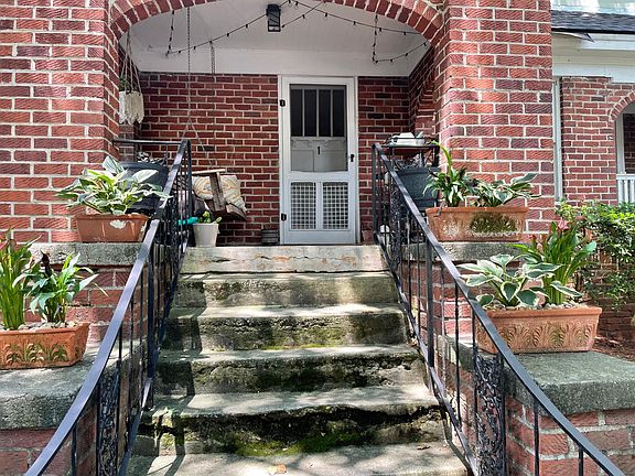 Steps to private porch and front door.
