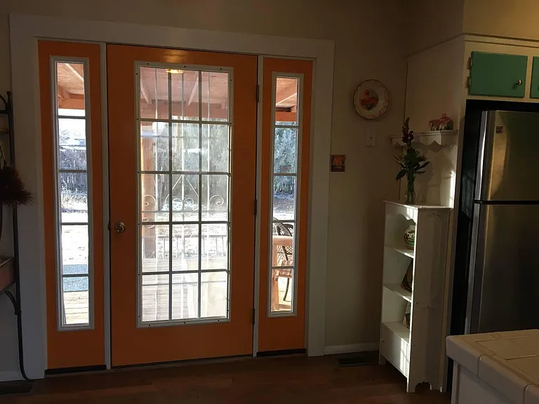 Door to back portal and back yard