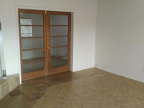 French doors leading to 3rd Bedroom/Den
