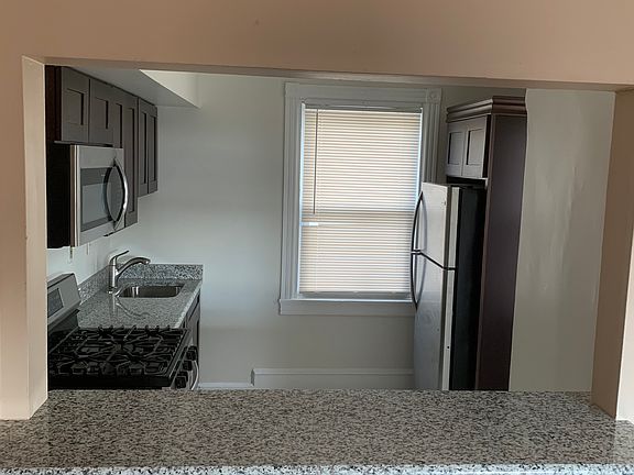 View into Kitchen from Dining Room counter Bar