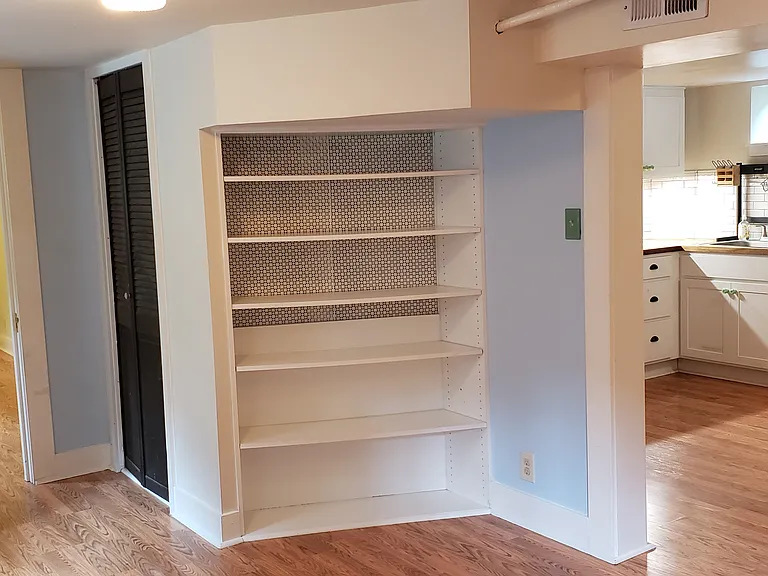 Unit B livingroom. Room #2 accessable, and eat-in area transition into kitchen.