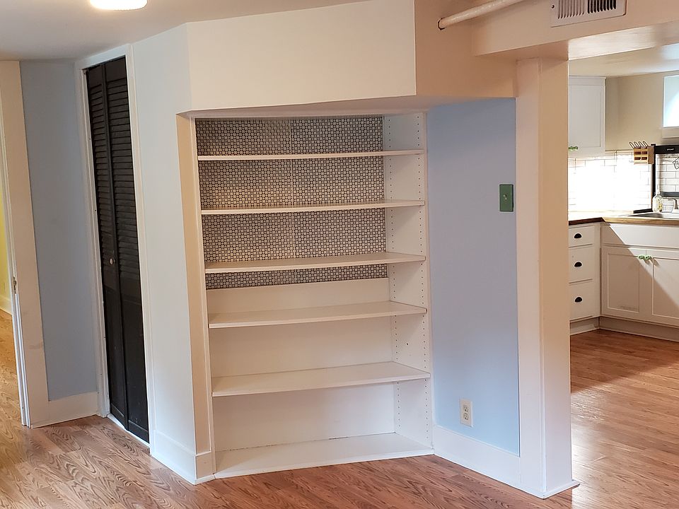 Unit B livingroom. Room #2 accessable, and eat-in area transition into kitchen.