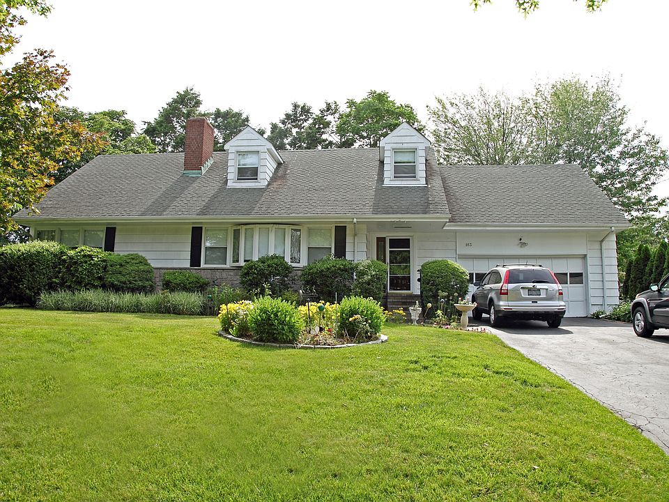 Front elevation, corner lot, 2 car attached garage with plen