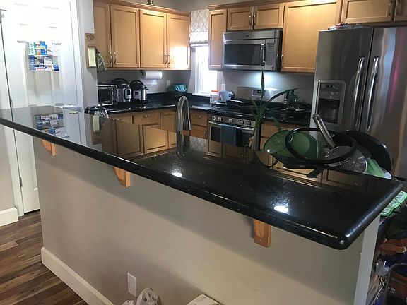 Kitchen with SS appliances & Granite counter tops
