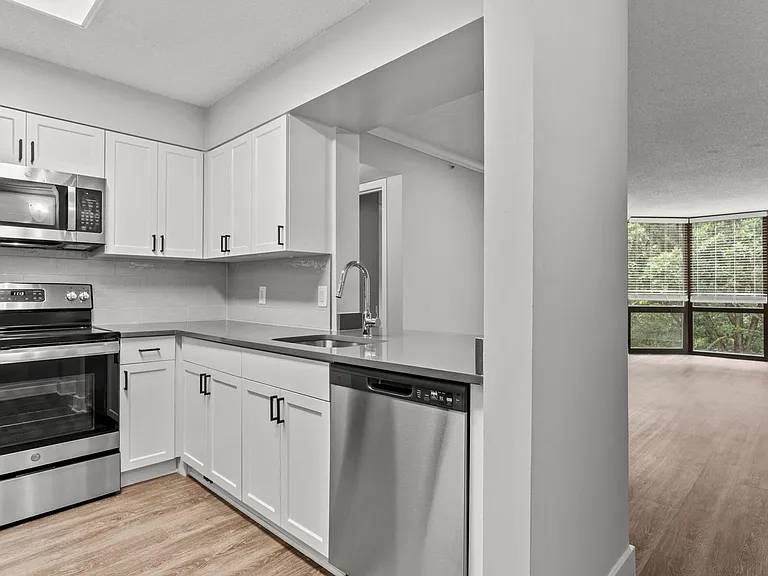 Your upgraded kitchen features quartz countertops