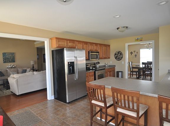 Another view of kitchen with Living & Dining in background