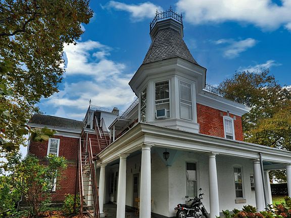 Wraparound porch, turret and more!