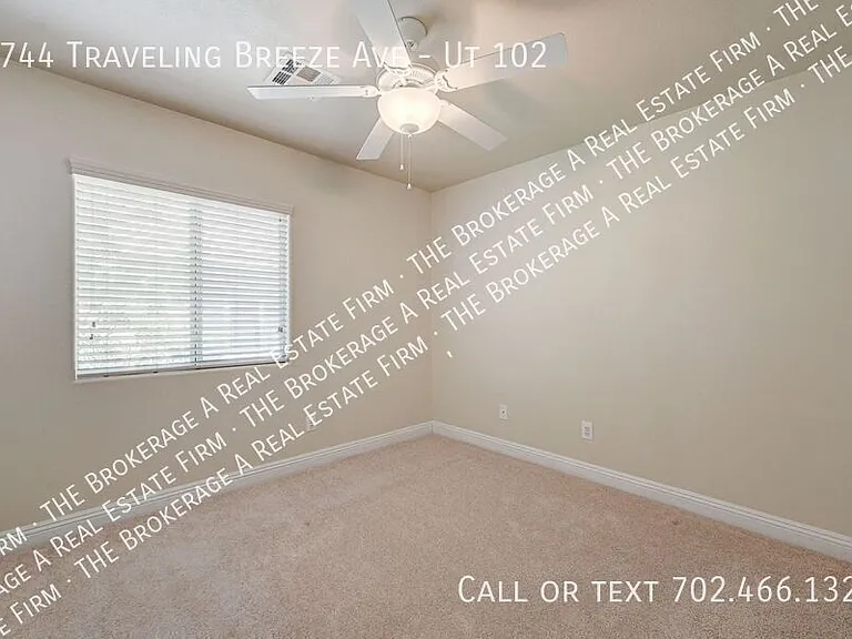 8744 Traveling Breeze Ave #102 — Photo 34