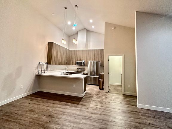kitchen w door to pantry/bar