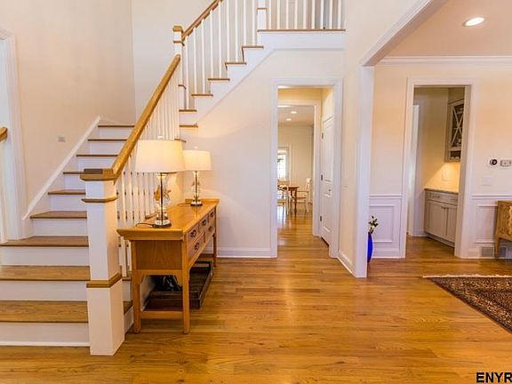 Gracious, sunny entry with wood floors.