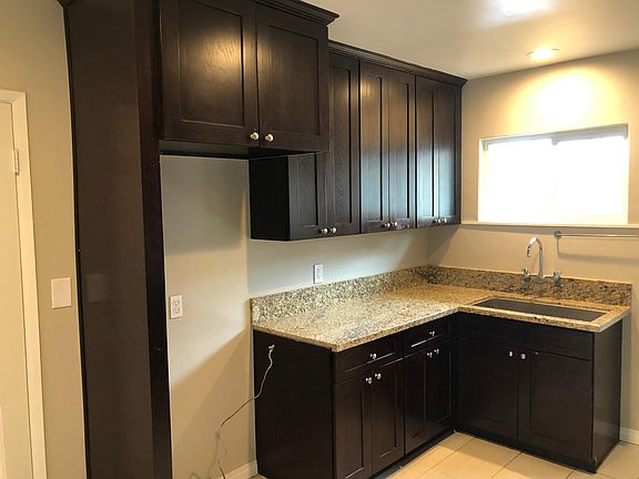 Updated kitchen with new cupboards & granite counters