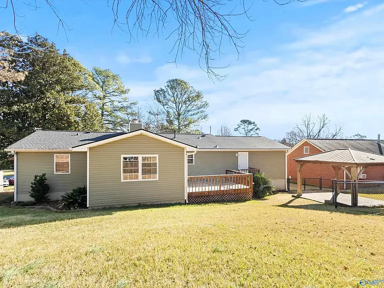 Gazebo in the backyard, perfect for summer BBQs and hosting friends