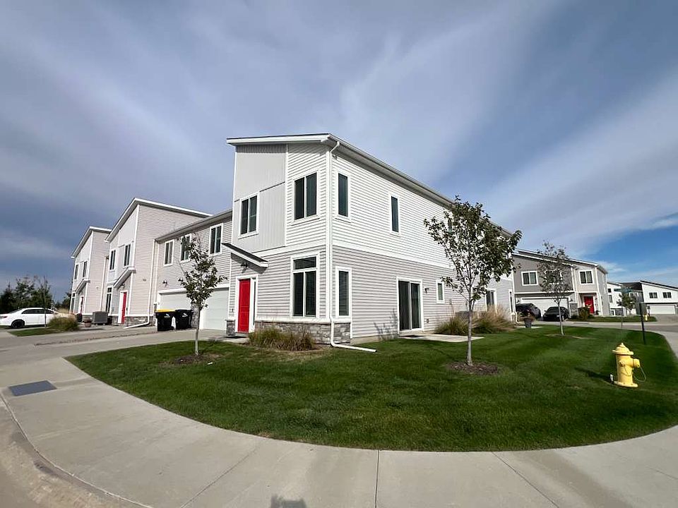 Beautiful corner unit townhome with outdoor patio space and plenty of sunlight in all rooms.