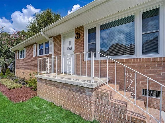 Front door view with large picture window
