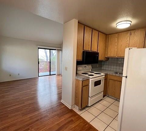 Dining Area Facing kitchen and Living Room