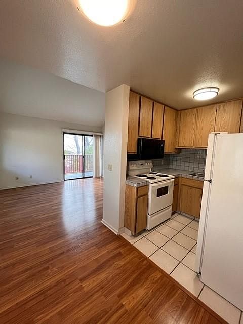 Dining Area Facing kitchen and Living Room
