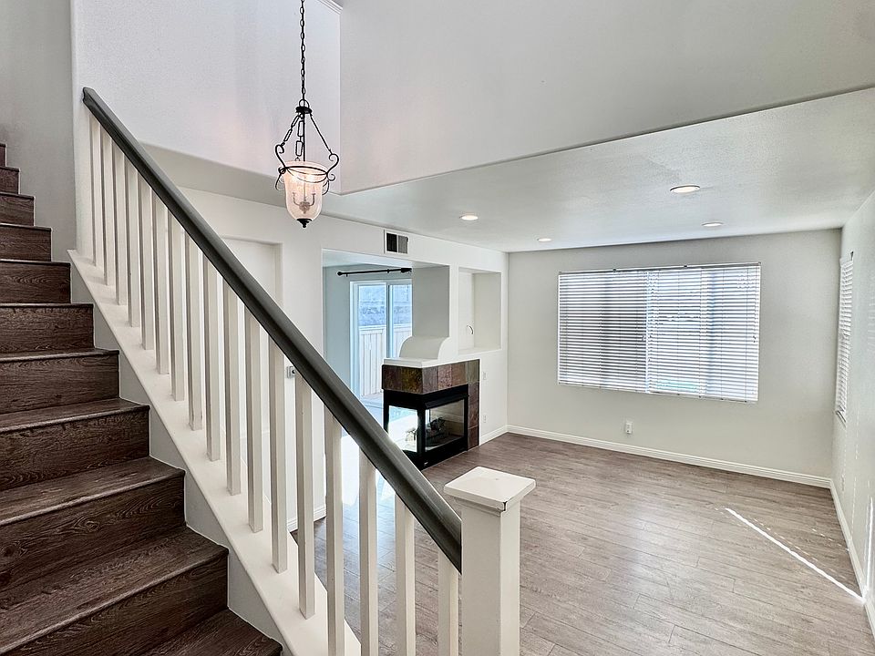 Entry view of stairs and living room.