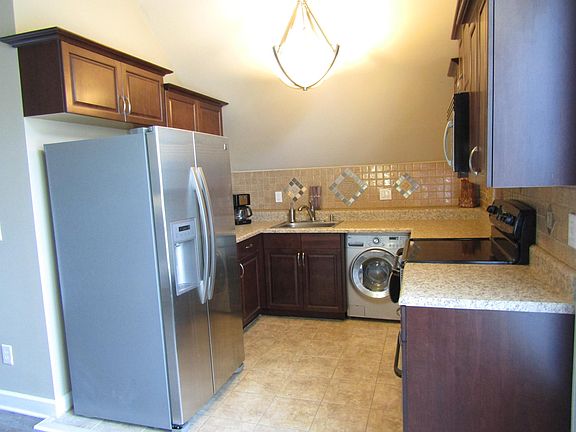 Large kitchen, stainless applicances.