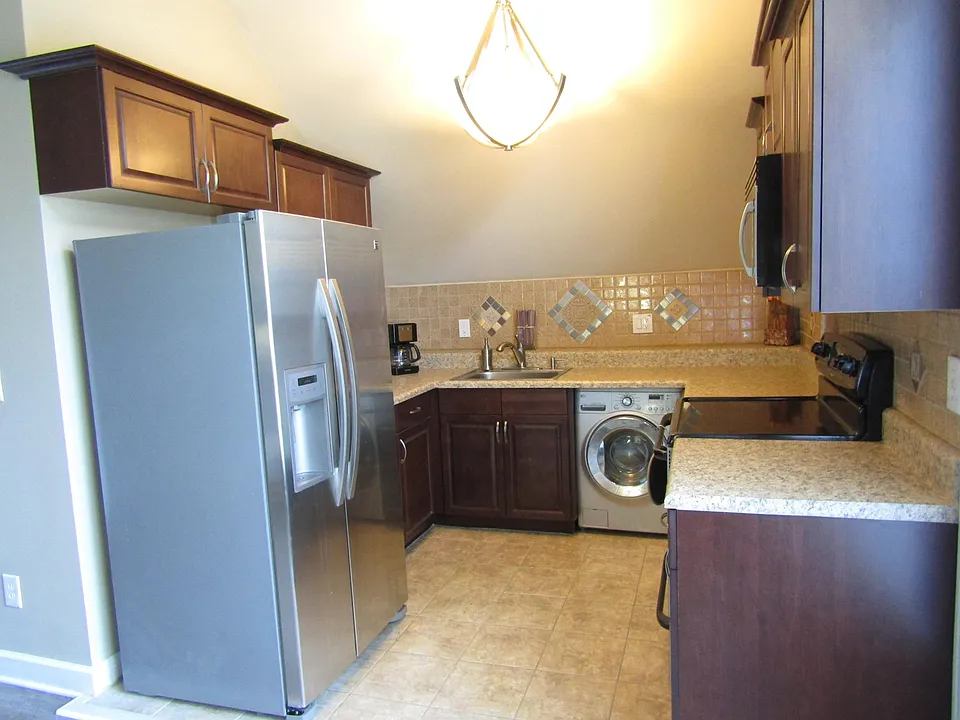 Large kitchen, stainless applicances.