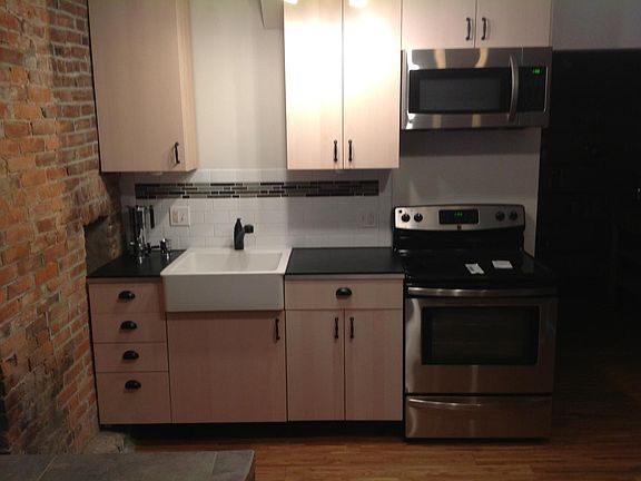 Kitchen is pleasant and modern.