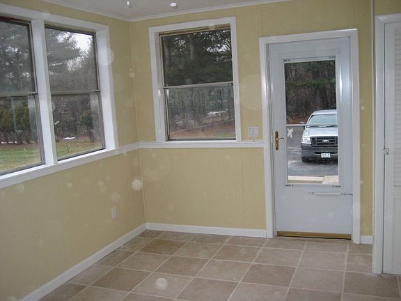 sun drenched porch off kitchen