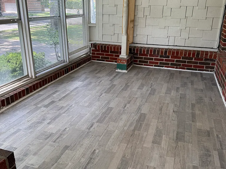 Newly covered enclosed front porch