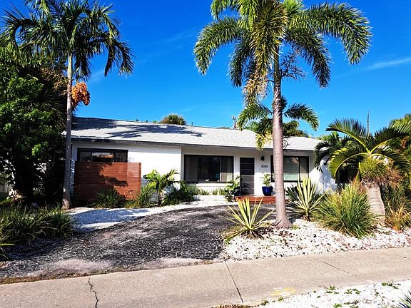 Front View with Parking for Three Vehicles