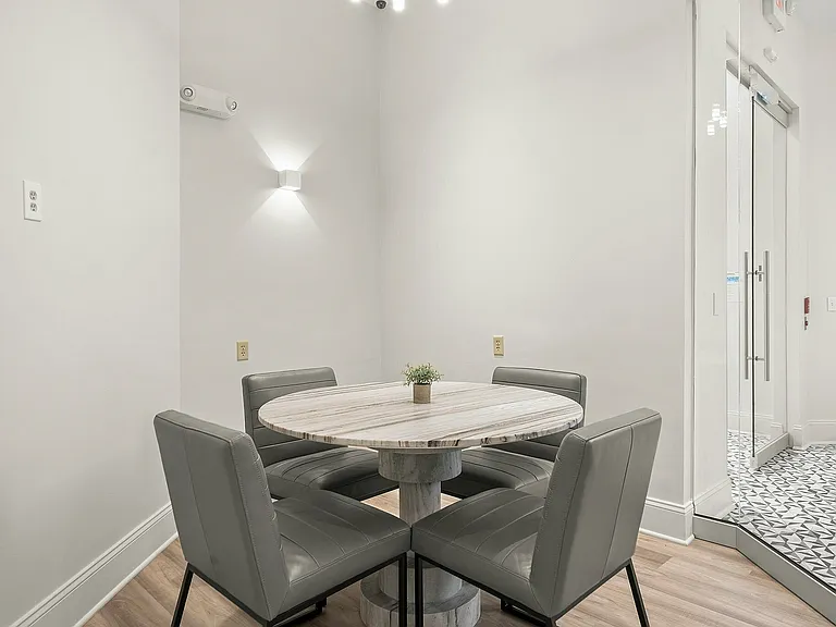 Experience cozy dining in this elegantly designed space, perfect for intimate gatherings.