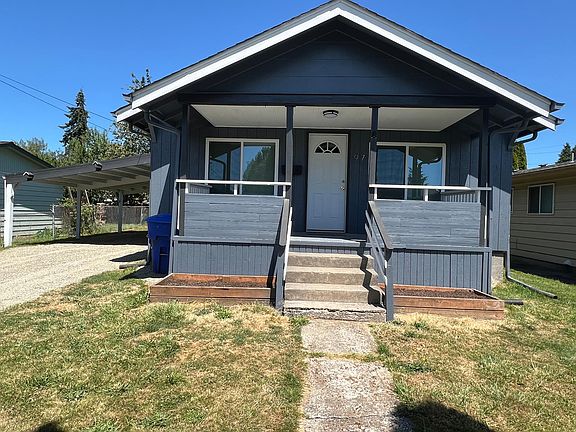 Newly painted exterior with front porch.