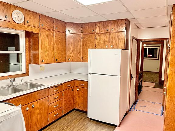 Kitchen has new flooring and appliances