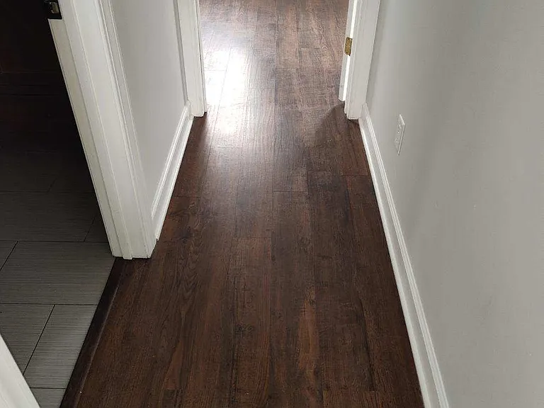 Hallway leading to first floor Master bedroom and first floor restroom.