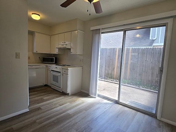 5th image of 2421 E 59th Ct Unit 4
