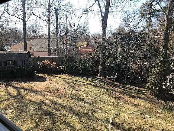 Yard to left of house