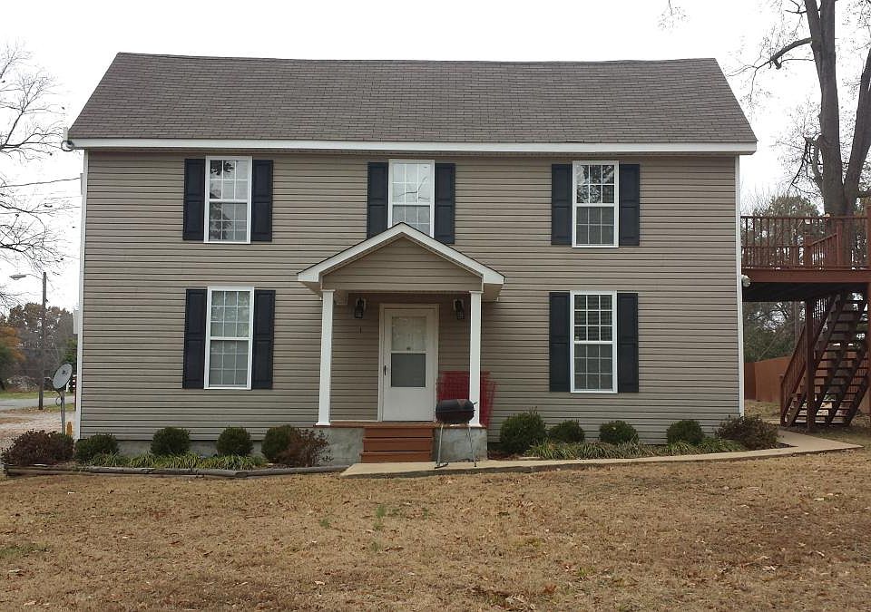 Front of house, upstairs apartment with deck.